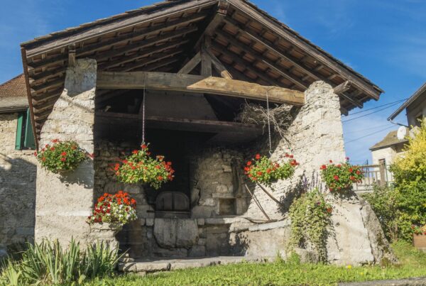 a building with flowers in front of it
